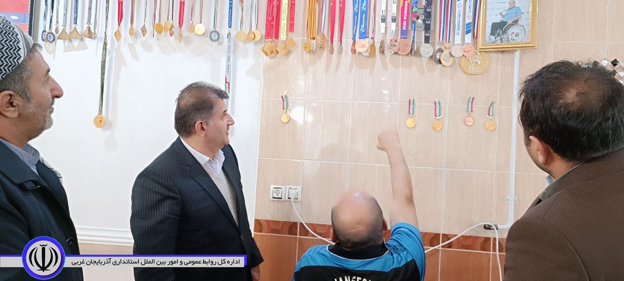 دیدار فرماندار اشنویه با حاج حسن جانفشان قهرمان ملی تنیس روی میز